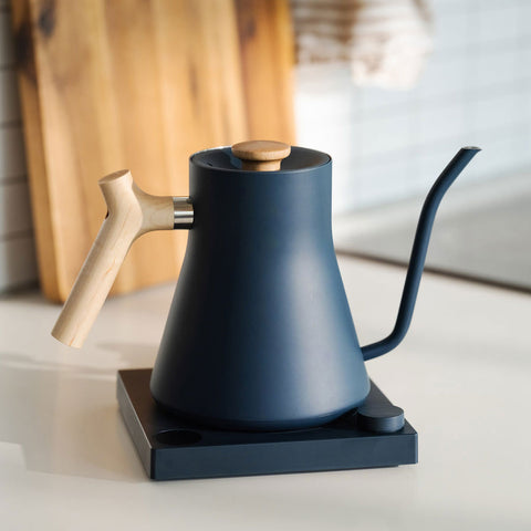 Fellow Stagg kettle in stone blue with walnut handle.